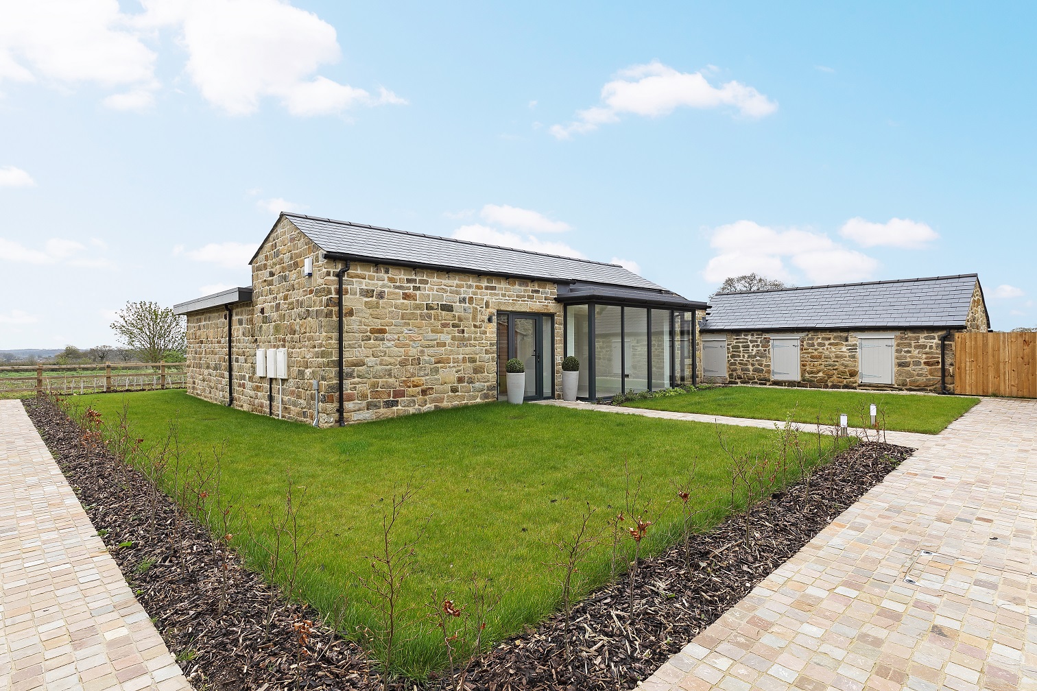 Photograph of Fairview House, the converted bungalow at Flying Horse Farm in Scholes. The image shows the front of the property.